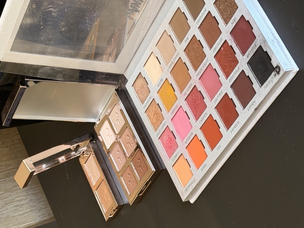 Professional eyeshadow palettes used in one-on-one makeup lessons