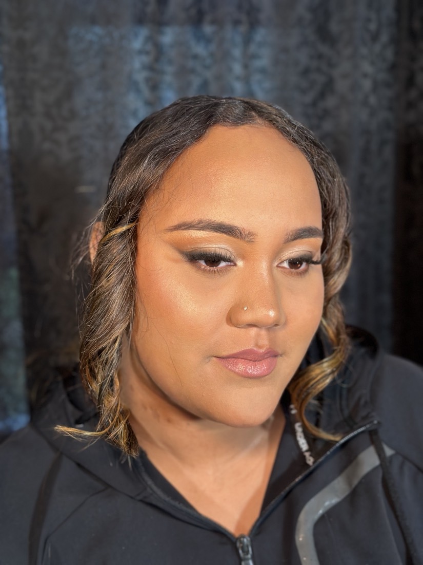 Evening glam makeup with defined eyes on a DS Artistry client